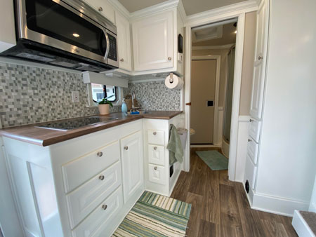 The interior of a custom Double D Trailers living quarters horse trailer 