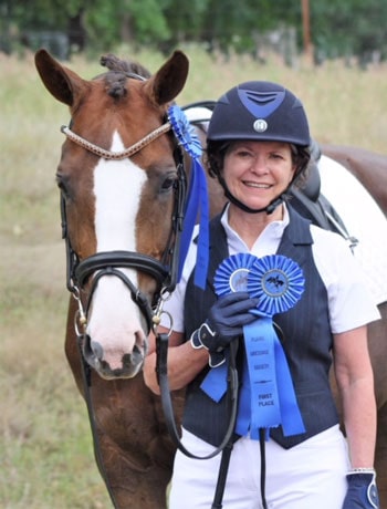 Double D Trailers owner Liz with her horse. 