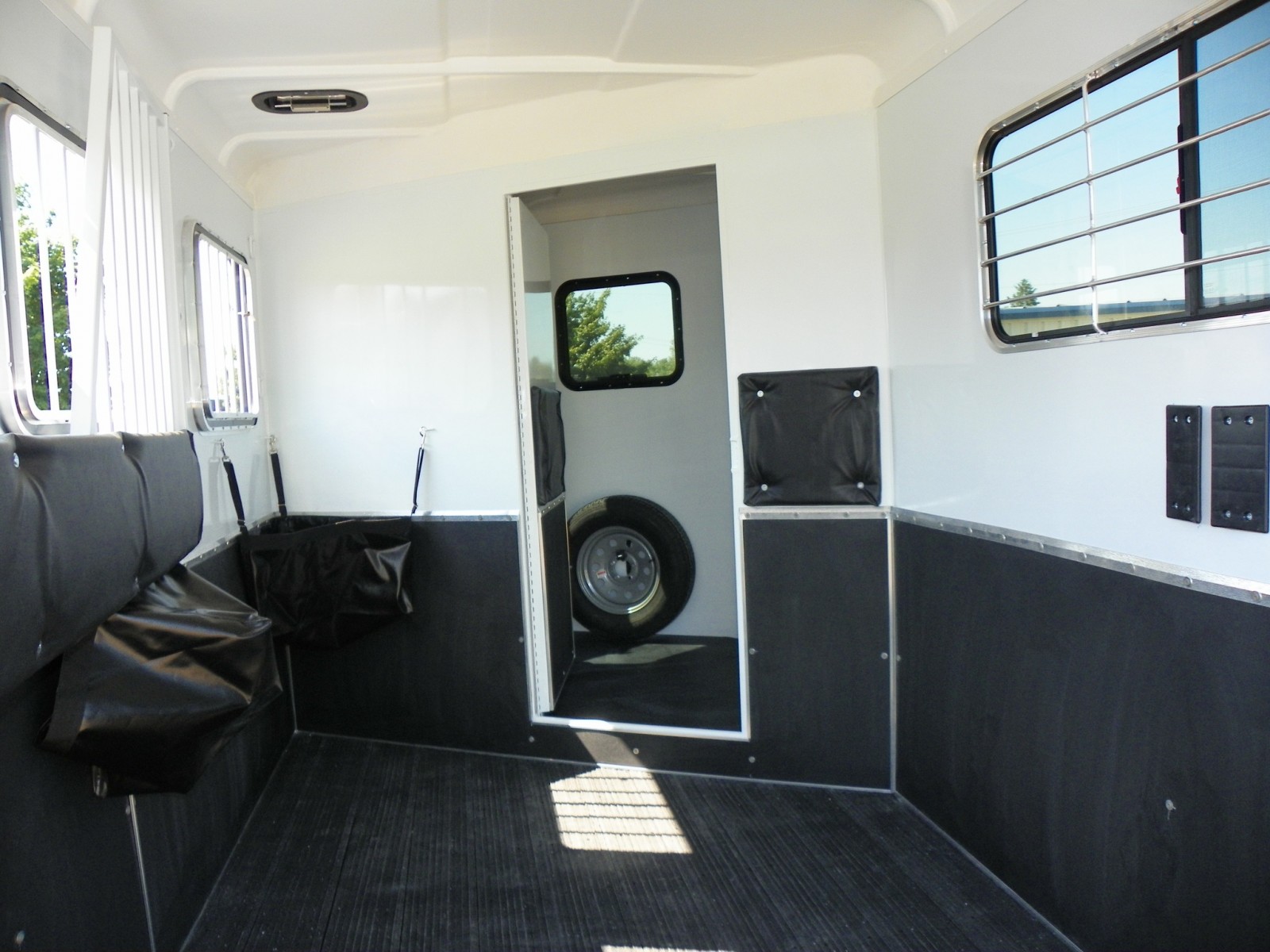 Standard mangers inside of a Double D horse trailer. 