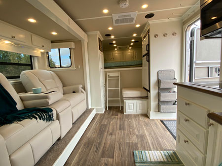 Custom living quarters horse trailer with white interior 
