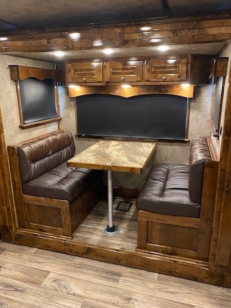 Dinette area inside of a Double D Trailers living quarters model. 