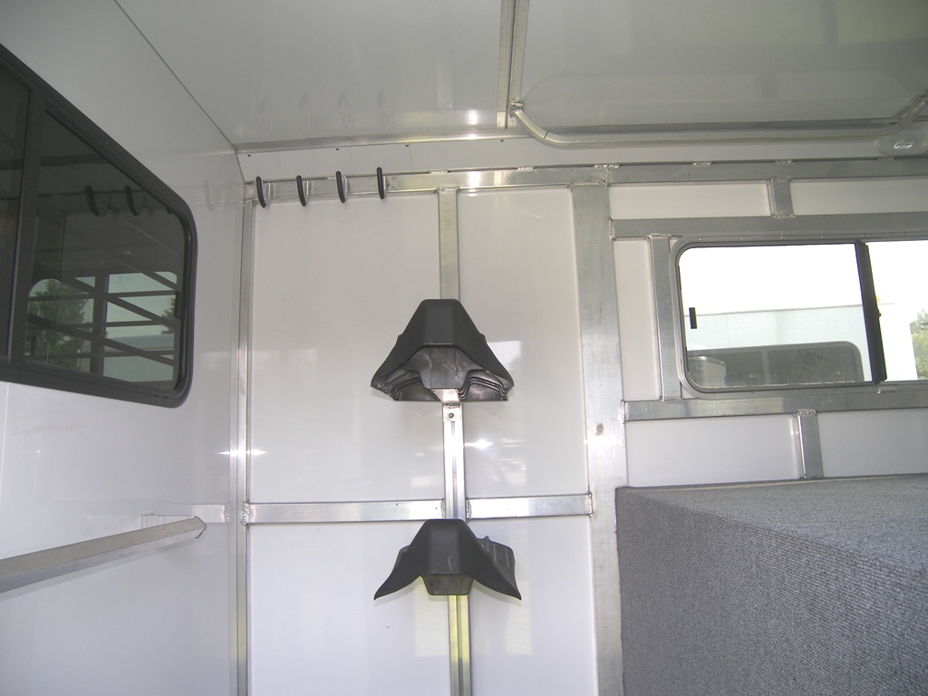 Your new Safetack comes standard with saddle racks in the rear of your trailer. Add this feature to add a saddle post inside your dressing room, allowing you to move your racks from the rear to your dress.  You will be able to store your saddles in either place. Pricing does not include additional saddle racks.