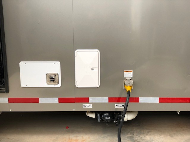 Power sources on the exterior of a horse trailer