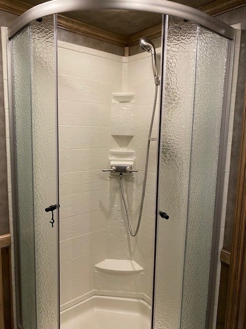 A shower inside of a horse trailer