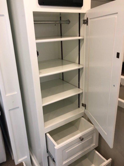 Storage cabinets inside of a horse trailer 