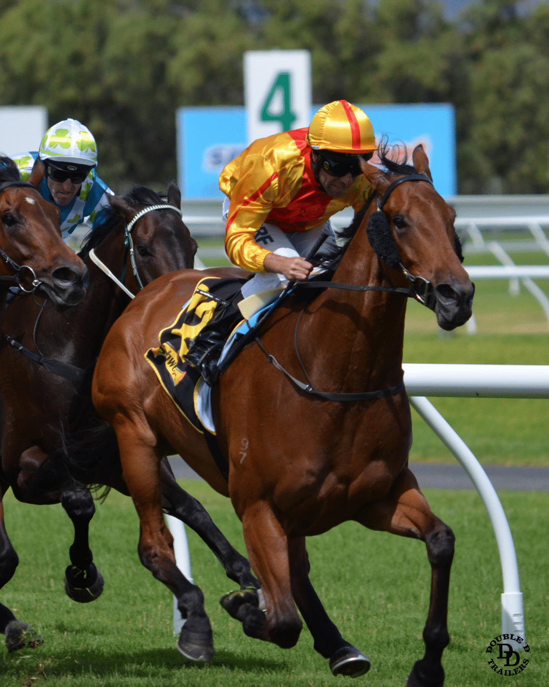 A horse jockey riding its horse