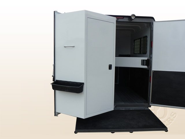 Double D Trailers patented SafeTack tack compartment swings out like a second rear door. 