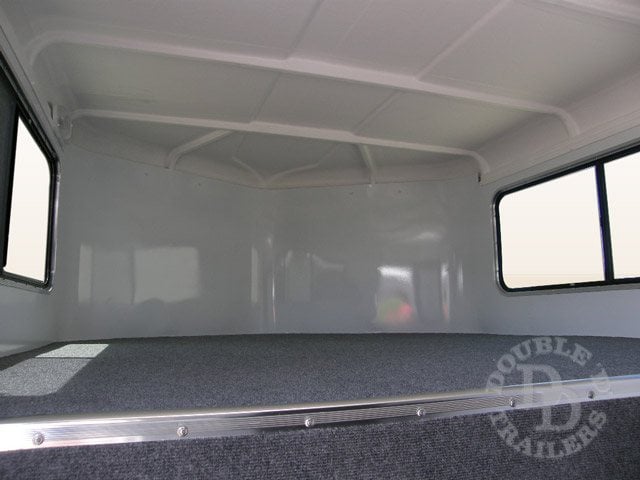 The gooseneck area of a Double D Trailers model - can be used to lay a mattress. 