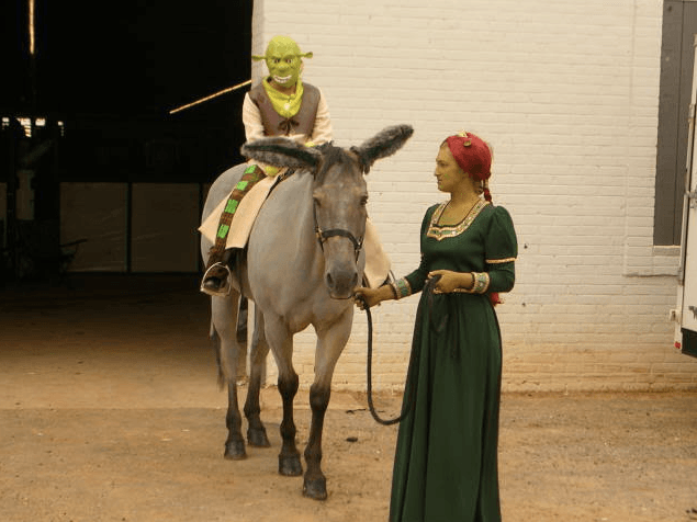 Horse dressed as Donkey from Shrek with rider in Shrek/Fiona costume for Halloween