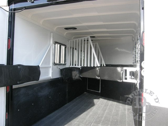 The horse stall area inside of a Double D Trailers gooseneck model. 