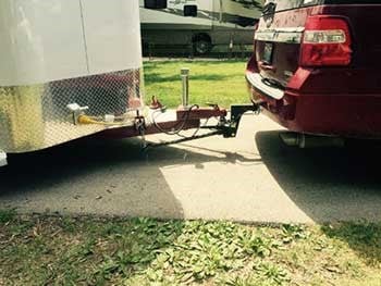 Hitch attachment for a bumper pull horse trailer.