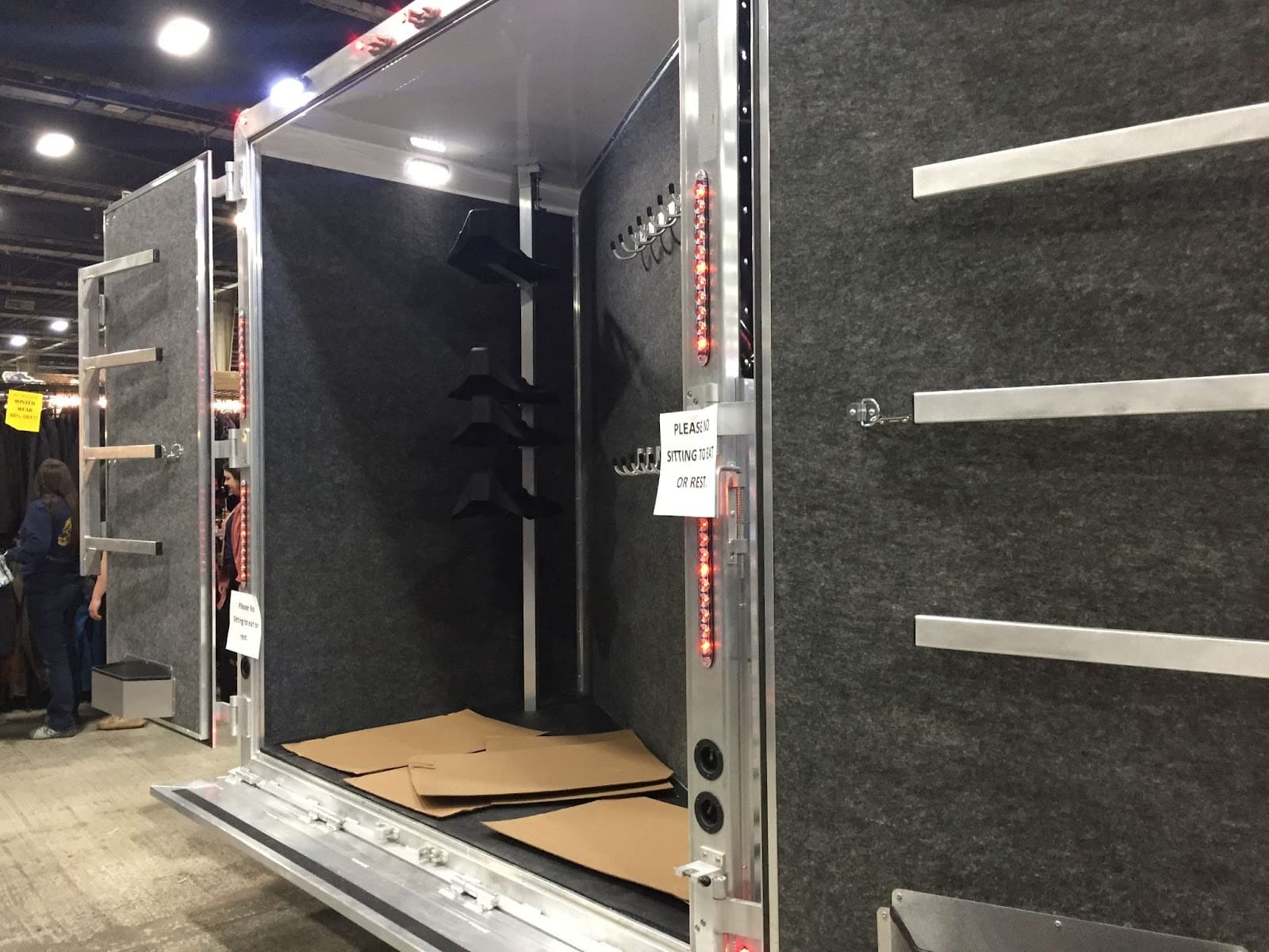 A rear tack storage area blocking the entire back of a slant load horse trailer