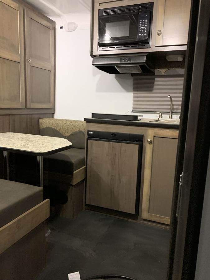 an inside view of a small living quarters horse trailer from Double D Trailers 