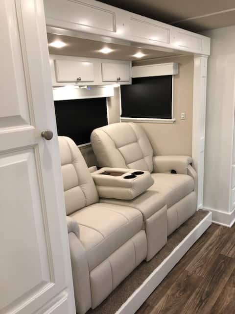 Flush mounted lighting inside of a living quarters horse trailer from Double D Trailers. 