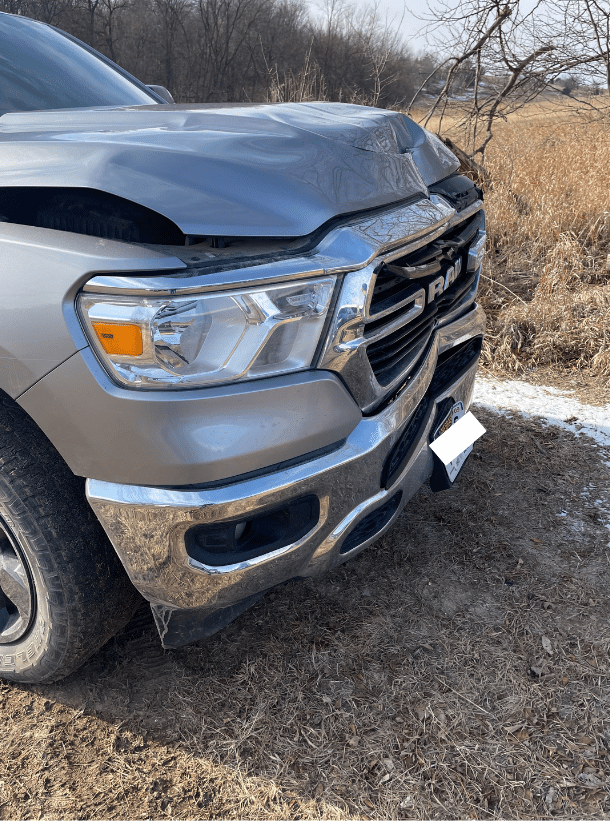 the front of a Dodge truck that was in an accident while towing a horse trailer. 