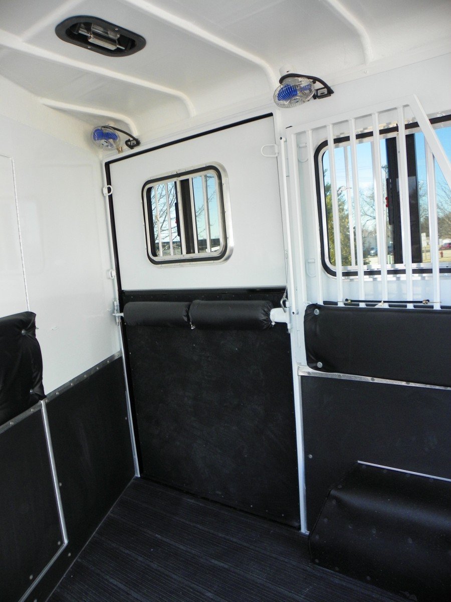 Horse trailer fans inside of a horse stall area of a Double D Trailer. 