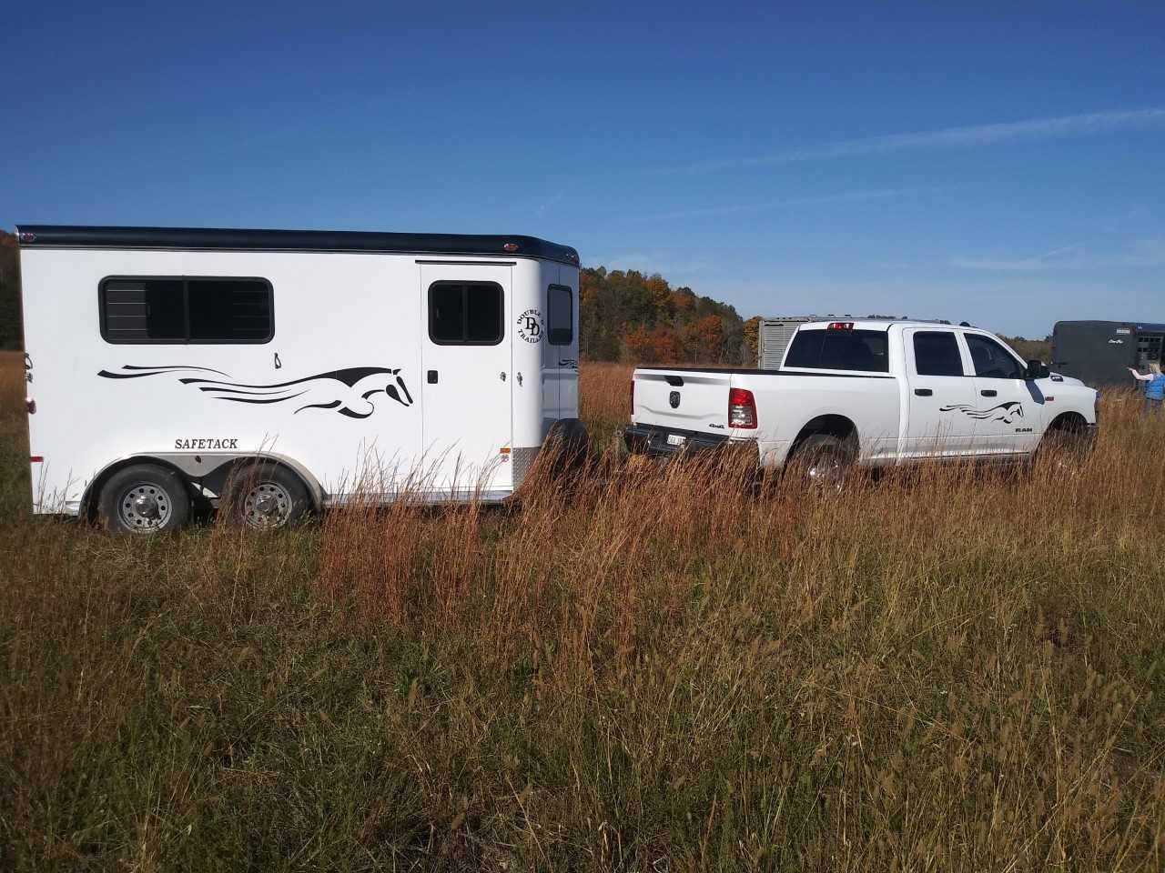 Double D Trailers Bumper Pull Horse Trailer hooked up to tow truck