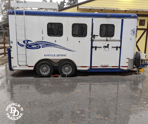 A custom SafeTack Reverse 2 horse bumper pull trailer from Double D trailers.