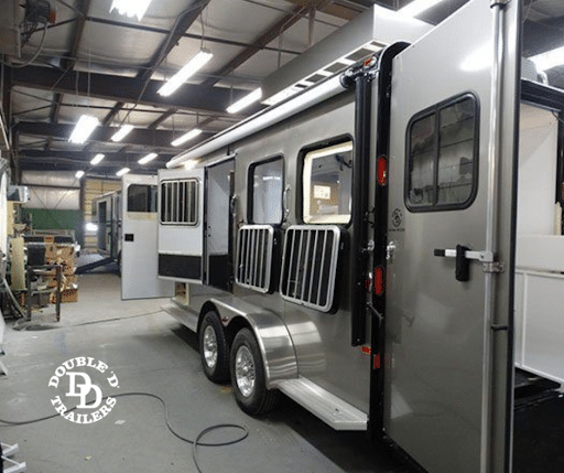 A custom Double D Trailer being built inside of the factory.