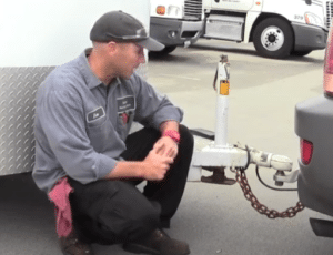  Inspecting a horse trailer adhering to federal regulations.