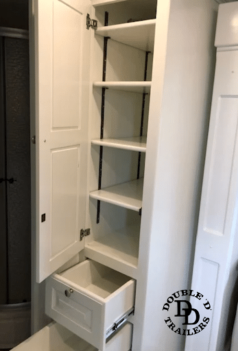 Storage cabinets inside of a Double D Trailers living quarters model