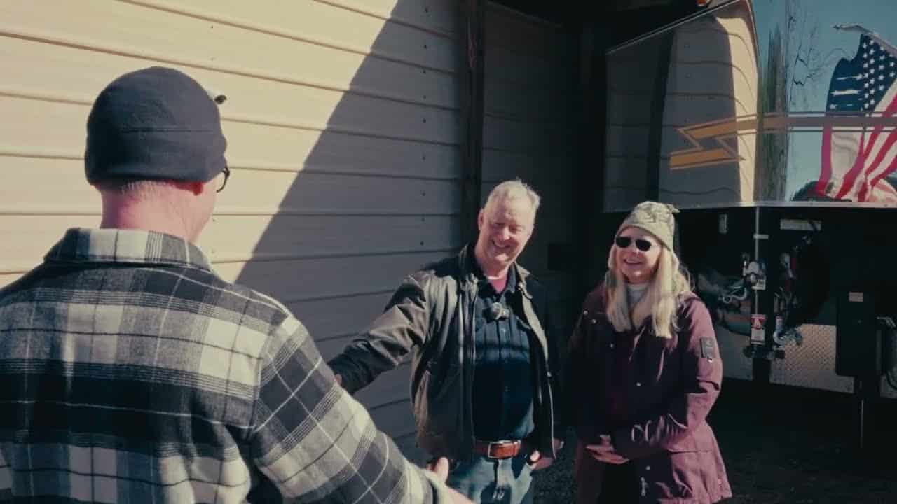 Double D Trailers owner Brad Heath with customers Mike and Shelley