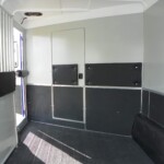 SafeKick recycled rubber wall panels inside Double D 2-horse gooseneck trailer stall