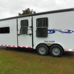 Double D Trailers 2-horse gooseneck trailer with drop-down windows