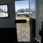 Horse area escape door on Double D 2-horse gooseneck trailer